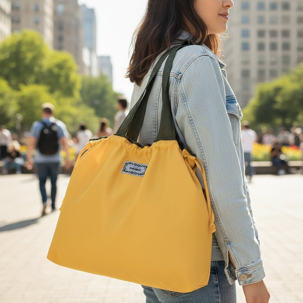Reusable tote bag with a rectangle design and wristlet strap, perfect for shopping and everyday use, featuring durable materials and stylish aesthetics. 5
