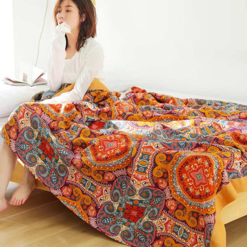 Reversible cotton cooling blanket featuring a stylish Boho design, perfect for breathability and easy machine washing. 5
