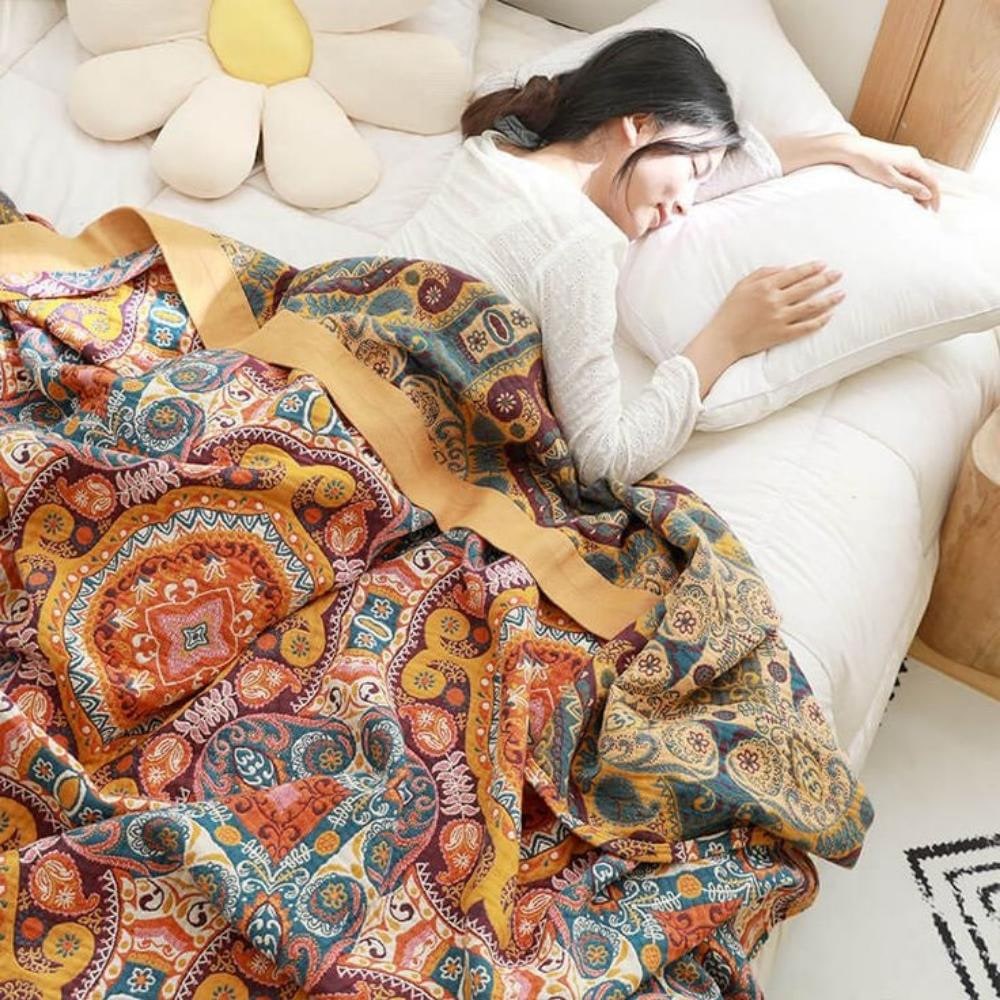 Reversible cotton cooling blanket featuring a stylish Boho design, perfect for breathability and easy machine washing. 3