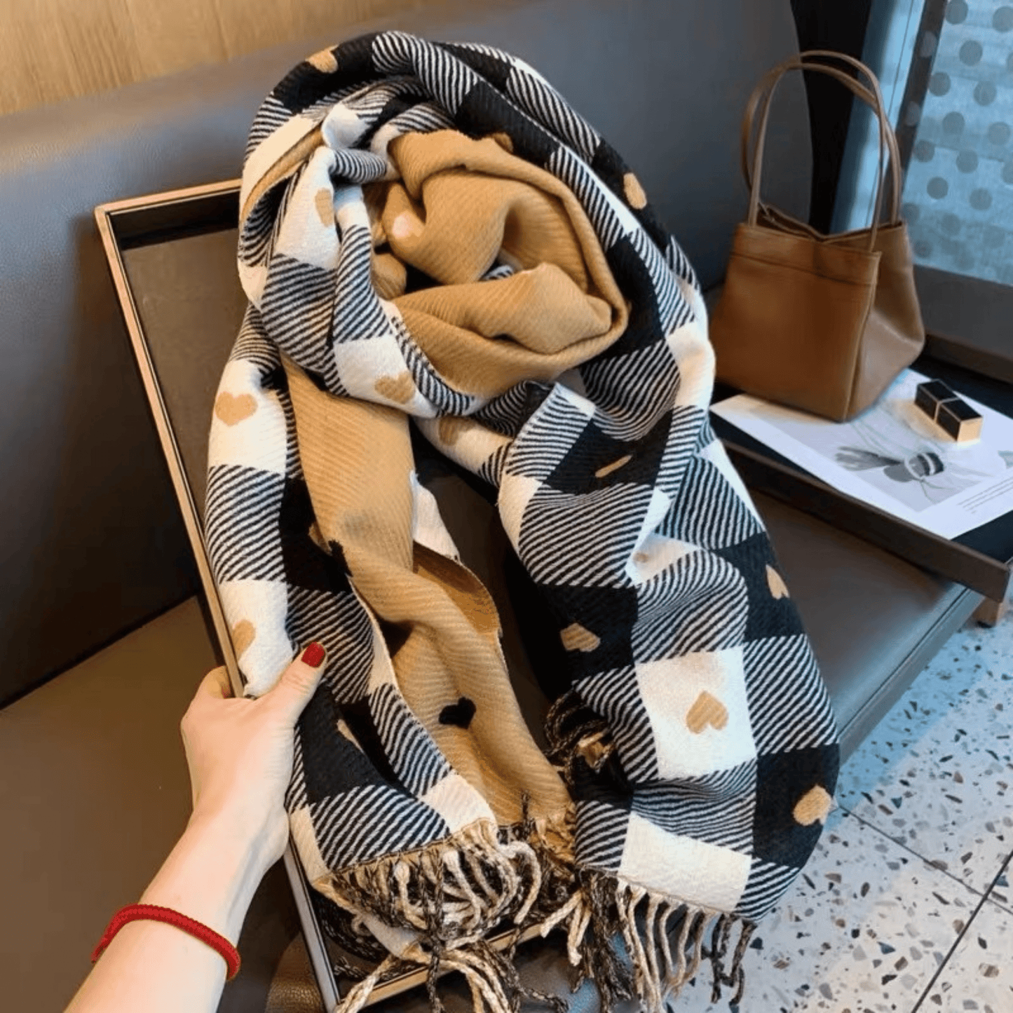 Reversible plaid scarf with tassels, featuring a lightweight and cozy design, made from a soft fabric blend, perfect for winter styling. 5