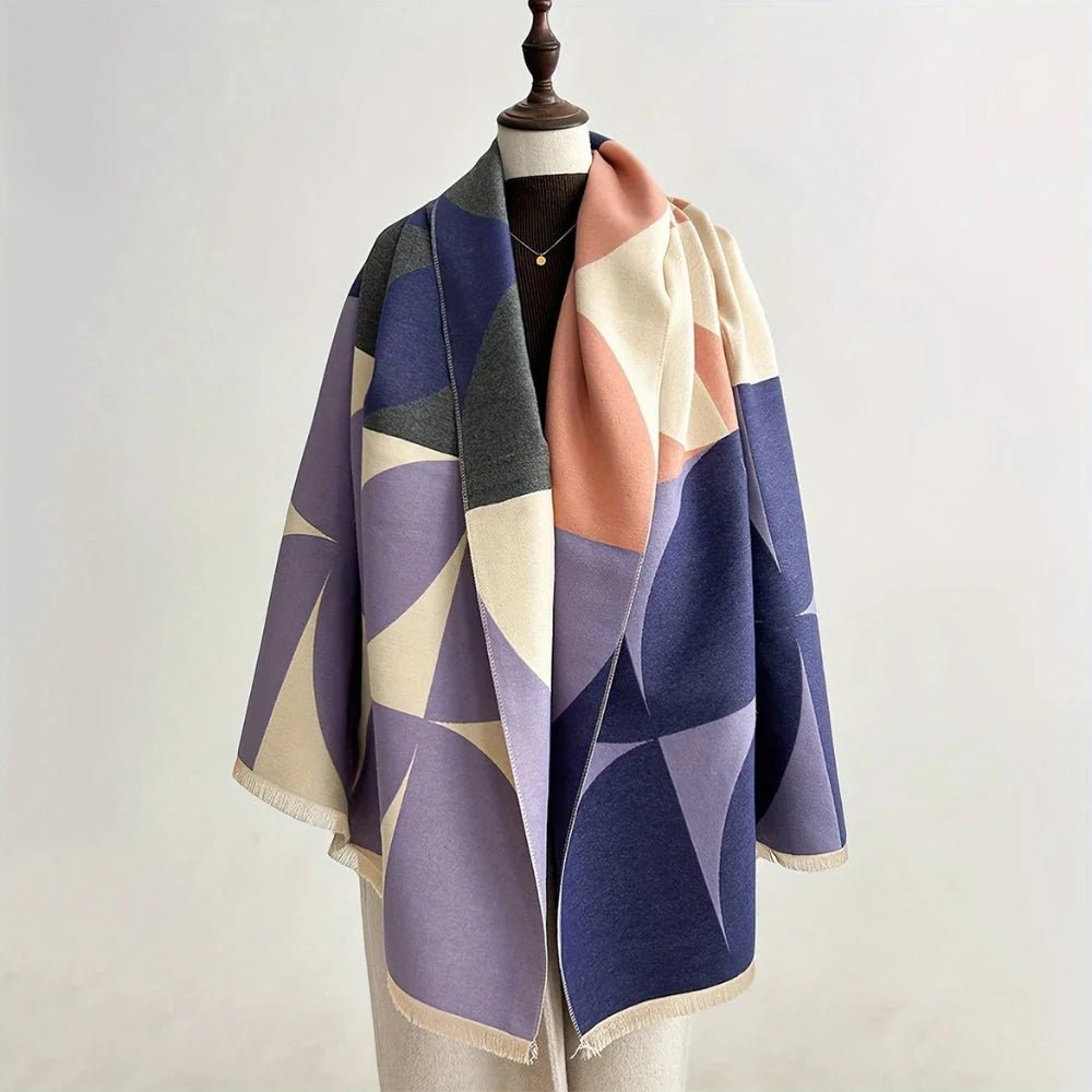 Reversible wrap scarf made from soft microfiber blend, featuring a lightweight design perfect for fall and winter styling. 6