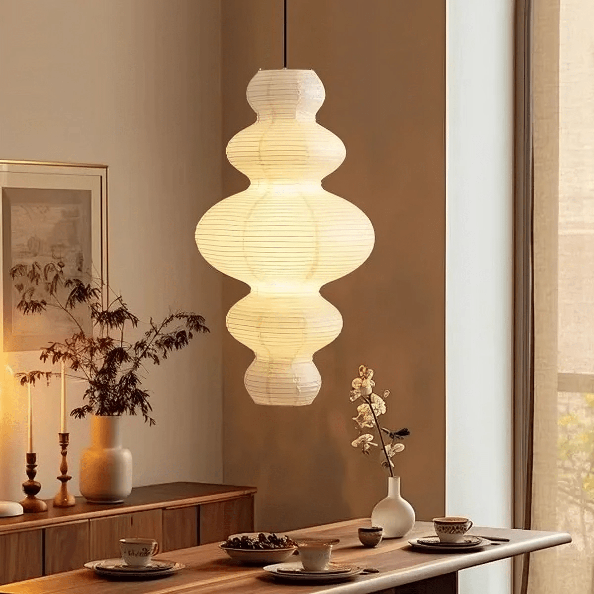 Rice paper hanging lamp featuring a minimalist design, adjustable height, and multi-layer structure, perfect for enhancing the ambiance in kitchens and dining areas. 0