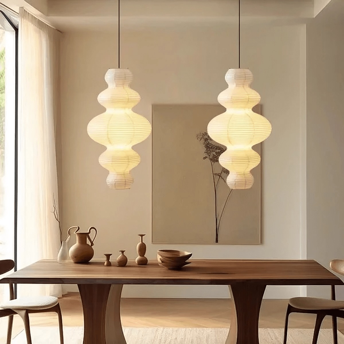 Rice paper hanging lamp featuring a minimalist design, adjustable height, and multi-layer structure, perfect for enhancing the ambiance in kitchens and dining areas. 2