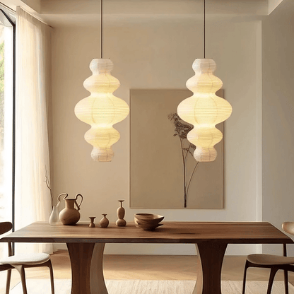 Rice paper hanging lamp featuring a minimalist design, adjustable height, and multi-layer structure, perfect for enhancing the ambiance in kitchens and dining areas. 2