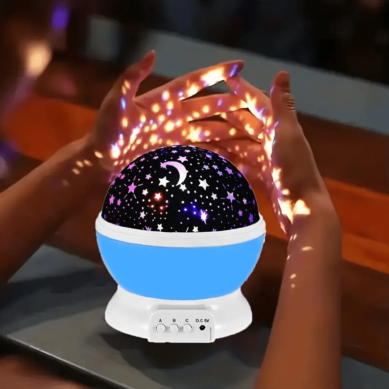 Rotating LED night light with multi-color projection and star patterns, perfect for bedrooms and nurseries, creating a soothing atmosphere for sleep. 3