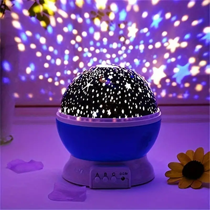 Rotating LED night light with multi-color projection and star patterns, perfect for bedrooms and nurseries, creating a soothing atmosphere for sleep. 1