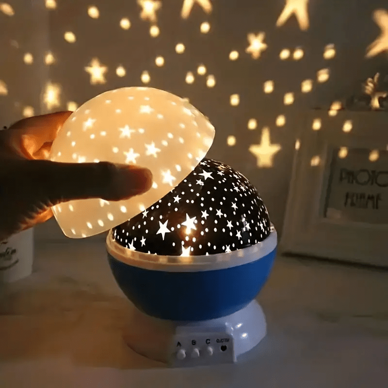 Rotating LED night light with multi-color projection and star patterns, perfect for bedrooms and nurseries, creating a soothing atmosphere for sleep. 0