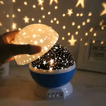 Rotating LED night light with multi-color projection and star patterns, perfect for bedrooms and nurseries, creating a soothing atmosphere for sleep. 0