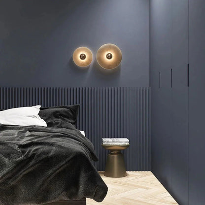 Round wall light featuring a natural alabaster face, available in elegant gold or bronze finish, designed for modern illumination and aesthetic appeal. 5