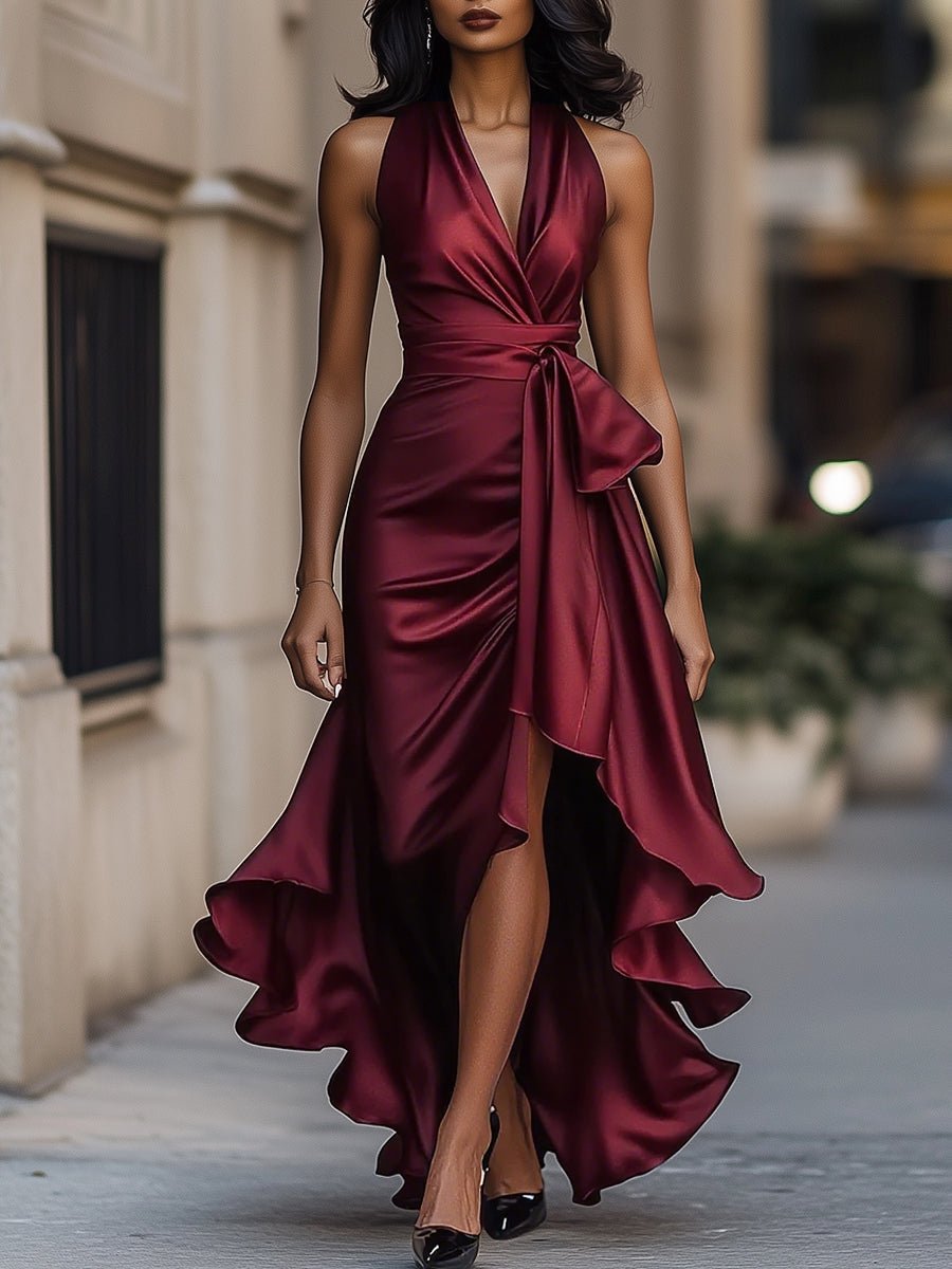 Satin evening gown in midnight navy featuring a high-low hem and ruffle details, perfect for weddings and formal events. 6