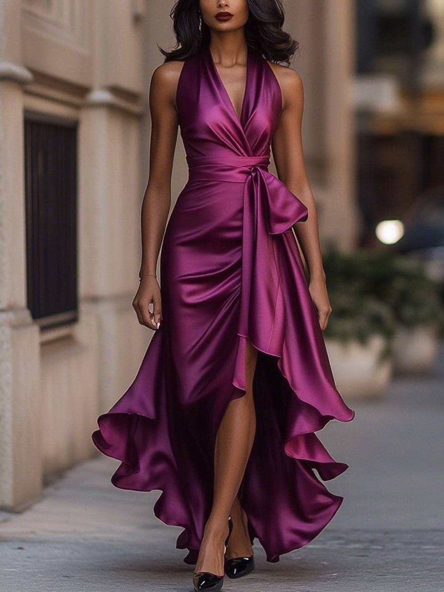 Satin evening gown in midnight navy featuring a high-low hem and ruffle details, perfect for weddings and formal events. 12