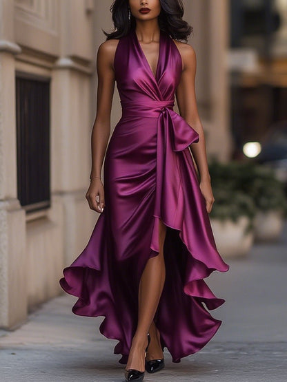 Satin evening gown in midnight navy featuring a high-low hem and ruffle details, perfect for weddings and formal events. 12
