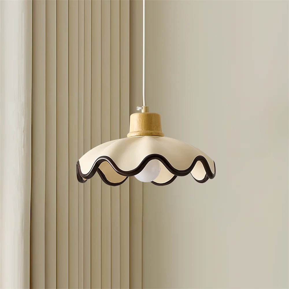 Scalloped pendant light featuring an adjustable height design and wood accent, ideal for dimmable kitchen island lighting. 0