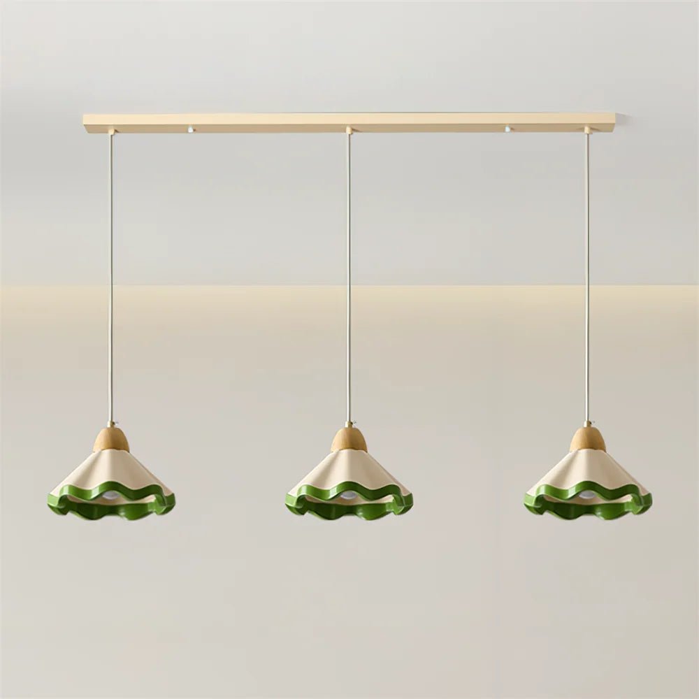 Scalloped pendant light featuring an adjustable height design and wood accent, ideal for dimmable kitchen island lighting. 12