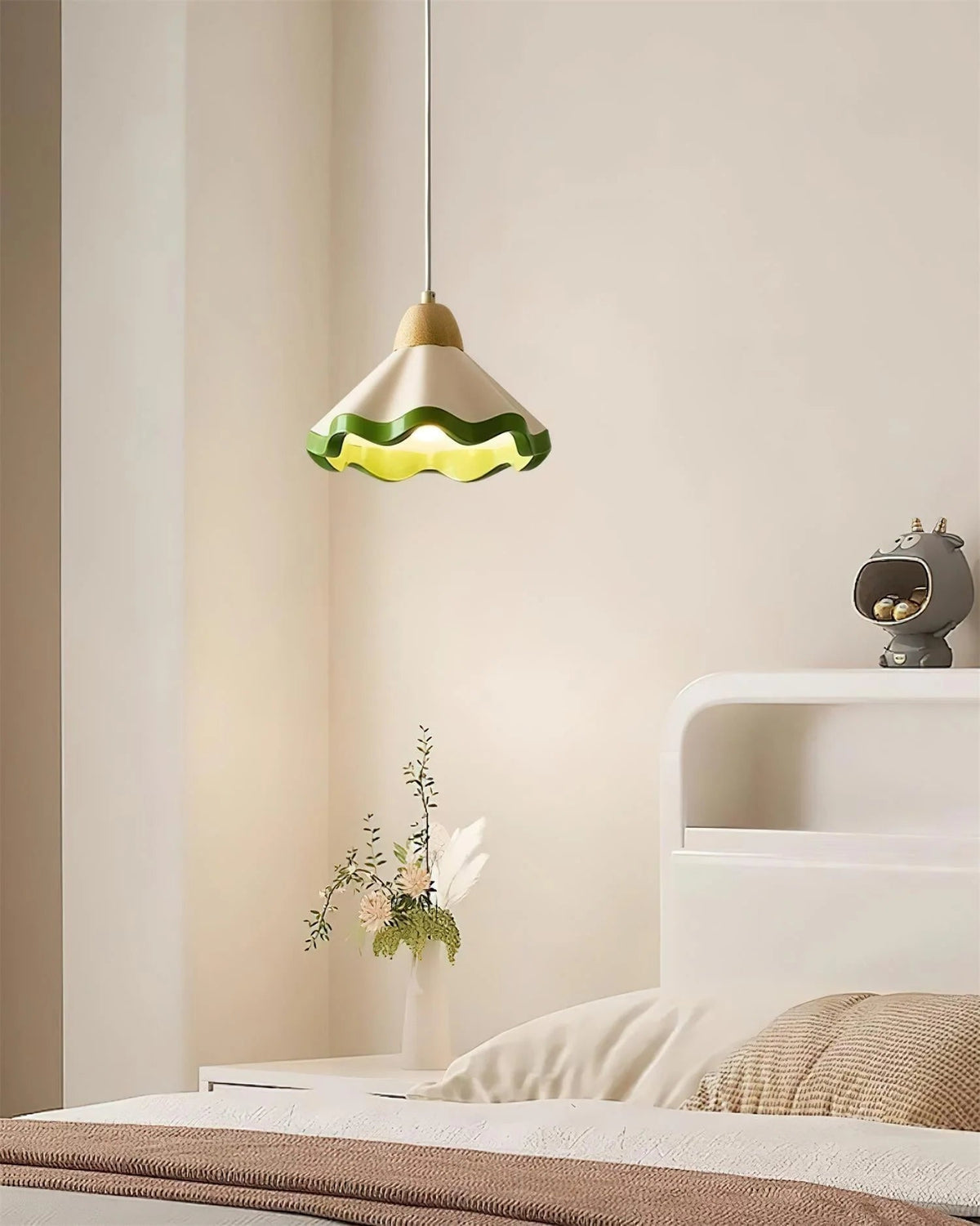 Scalloped pendant light featuring an adjustable height design and wood accent, ideal for dimmable kitchen island lighting. 3