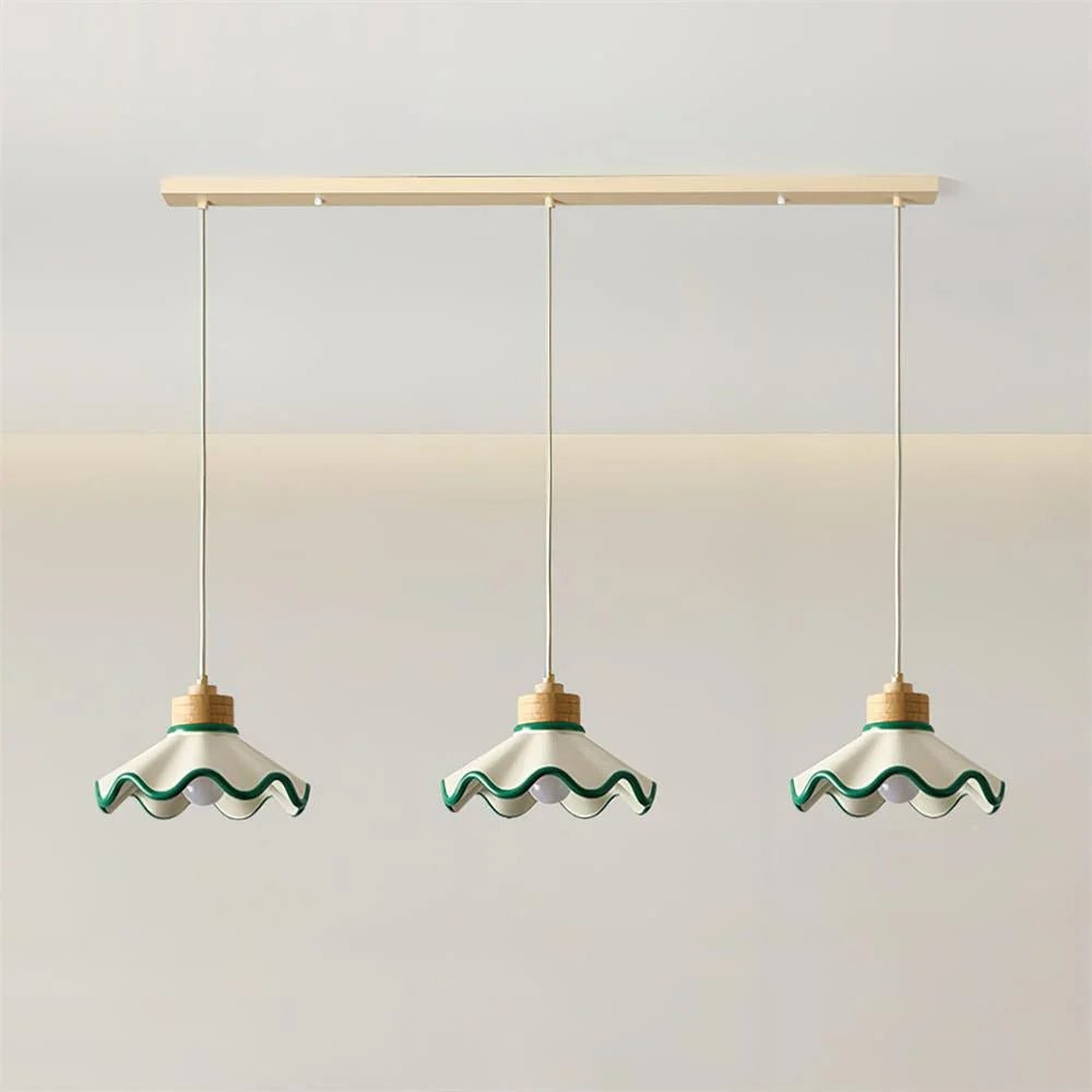 Scalloped pendant light featuring an adjustable height design and wood accent, ideal for dimmable kitchen island lighting. 11