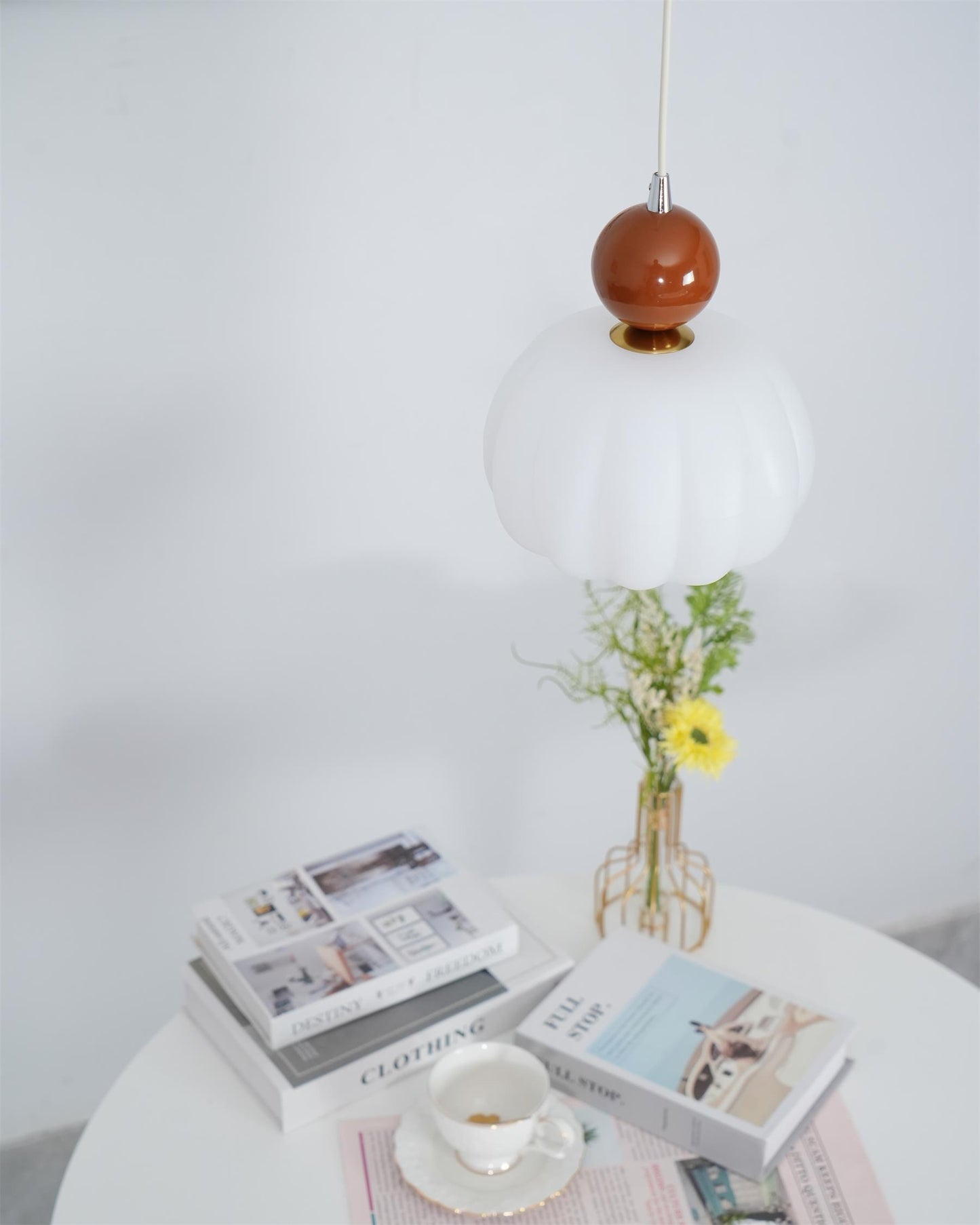 Scandinavian hanging lamp featuring a sleek metal and acrylic design, with adjustable LED light, perfect for modern interior spaces. 8