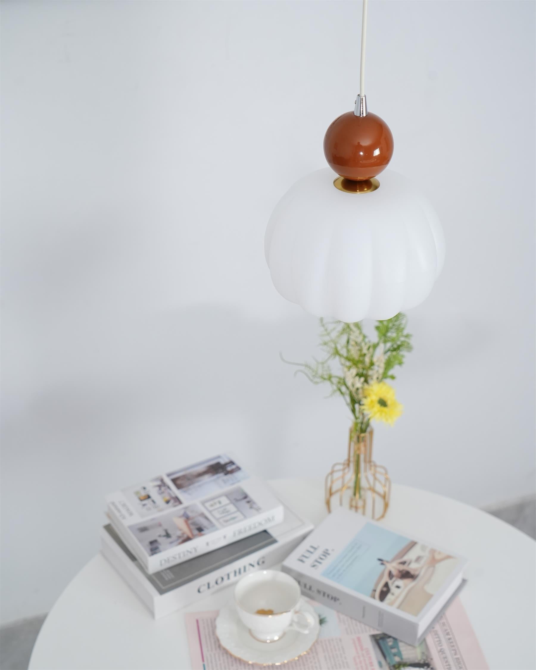 Scandinavian hanging lamp featuring a sleek metal and acrylic design, with adjustable LED light, perfect for modern interior spaces. 8