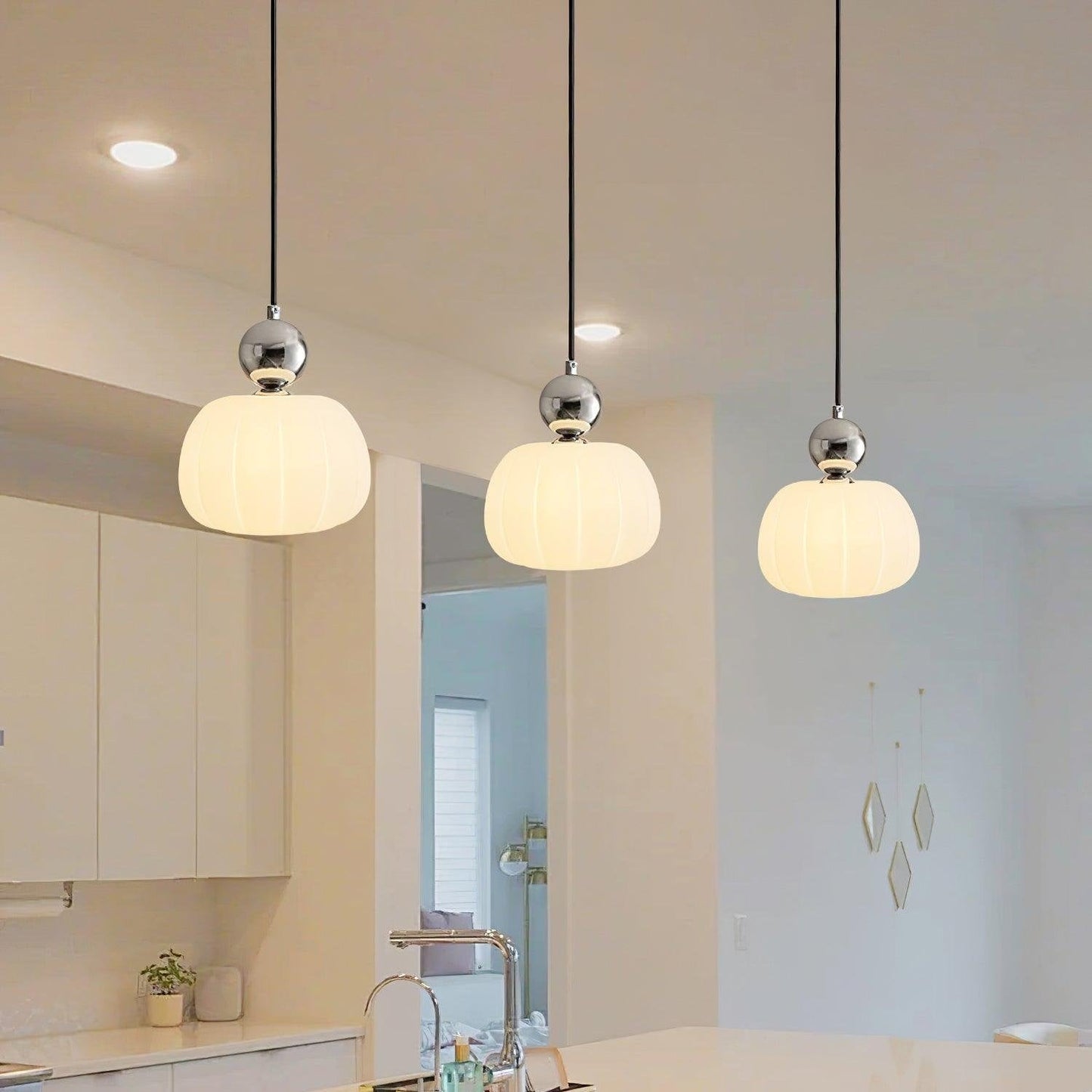 Scandinavian hanging lamp featuring a sleek metal and acrylic design, with adjustable LED light, perfect for modern interior spaces. 3