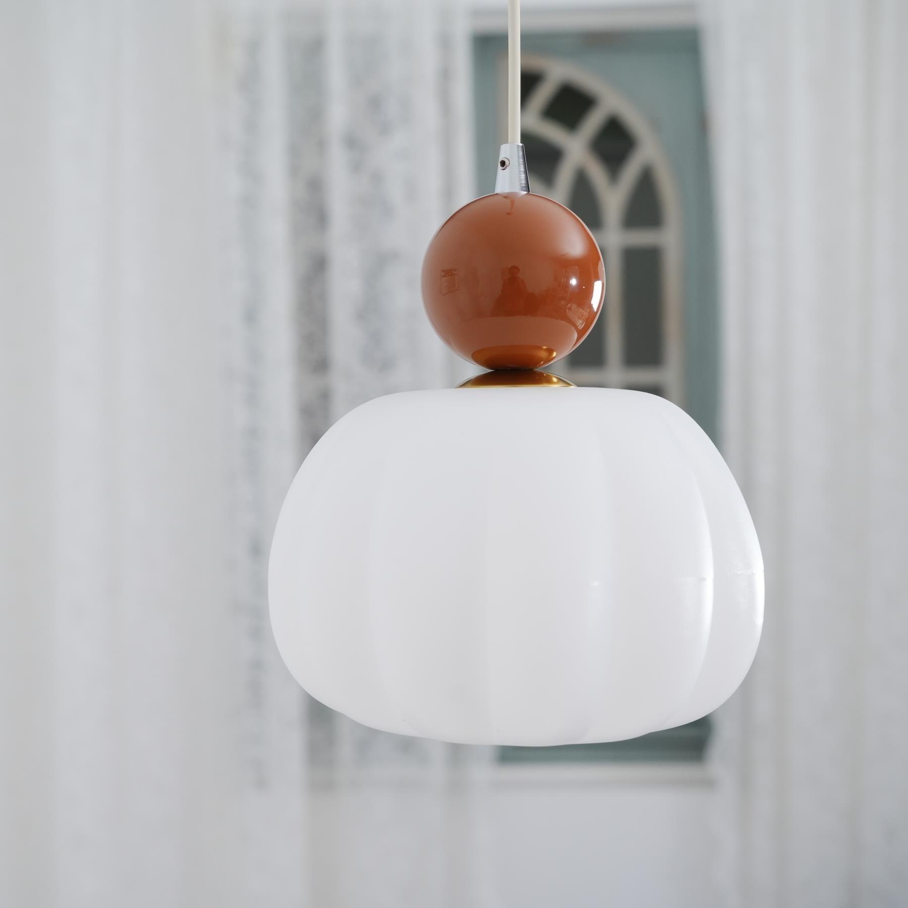 Scandinavian hanging lamp featuring a sleek metal and acrylic design, with adjustable LED light, perfect for modern interior spaces. 6