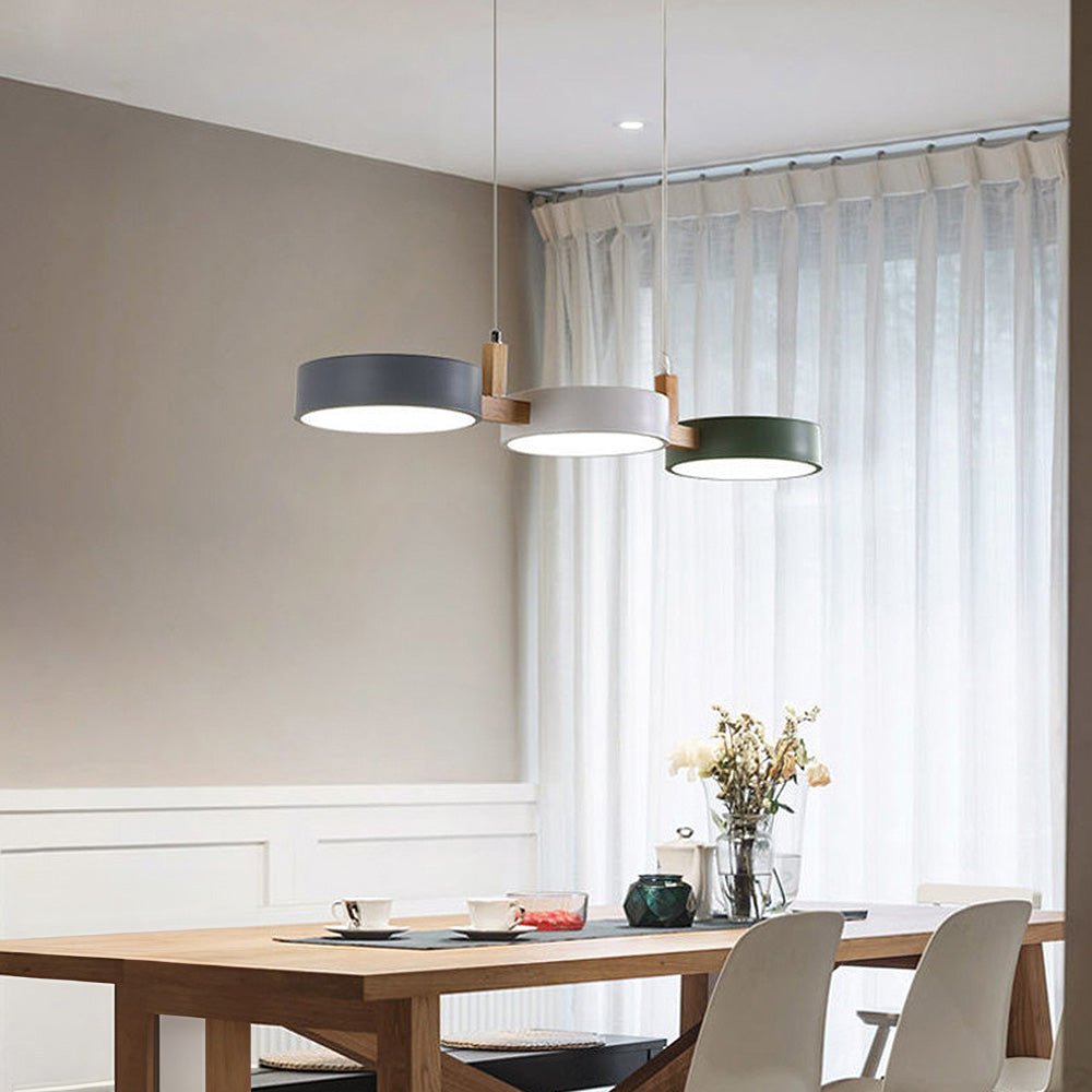 Scandinavian hanging lamp featuring a modern minimalist design with metal and wood accents, perfect for stylish home décor. 3