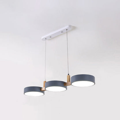 Scandinavian hanging lamp featuring a modern minimalist design with metal and wood accents, perfect for stylish home décor. 7