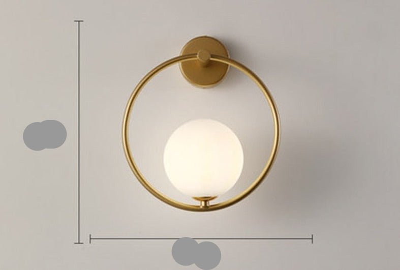 Scandinavian wall lamp featuring a modern minimalist design in gold and black with dimmable LED lighting for adjustable ambiance. 10