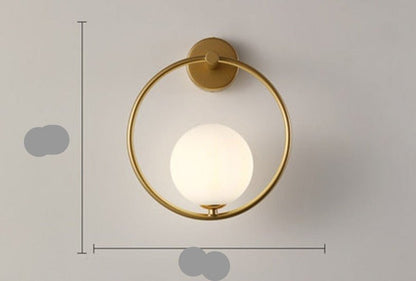 Scandinavian wall lamp featuring a modern minimalist design in gold and black with dimmable LED lighting for adjustable ambiance. 10