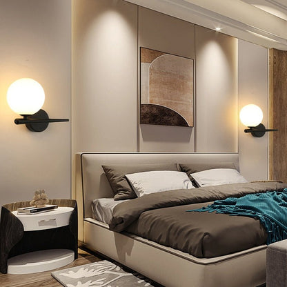 Scandinavian wall lamp featuring a modern minimalist design in gold and black with dimmable LED lighting for adjustable ambiance. 6