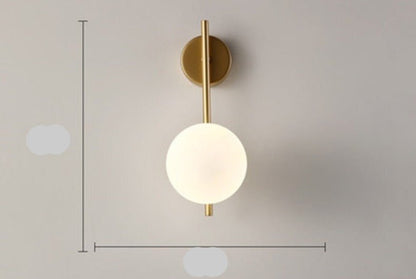 Scandinavian wall lamp featuring a modern minimalist design in gold and black with dimmable LED lighting for adjustable ambiance. 8