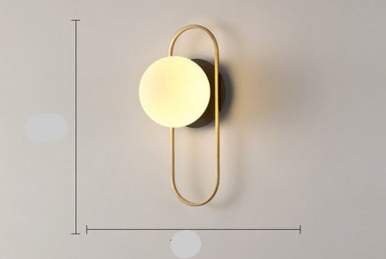 Scandinavian wall lamp featuring a modern minimalist design in gold and black with dimmable LED lighting for adjustable ambiance. 11