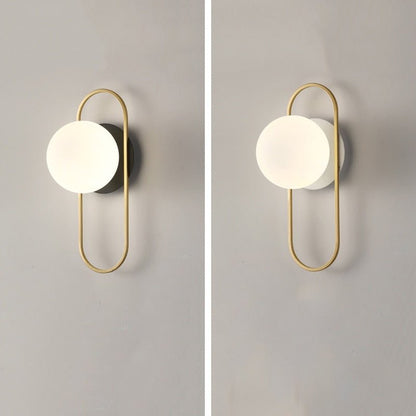 Scandinavian wall lamp featuring a modern minimalist design in gold and black with dimmable LED lighting for adjustable ambiance. 5