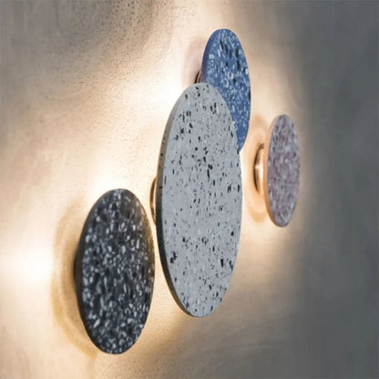 Scandinavian wall lamp featuring a warm LED light and stylish terrazzo finish, perfect for modern minimalist home decor. 3