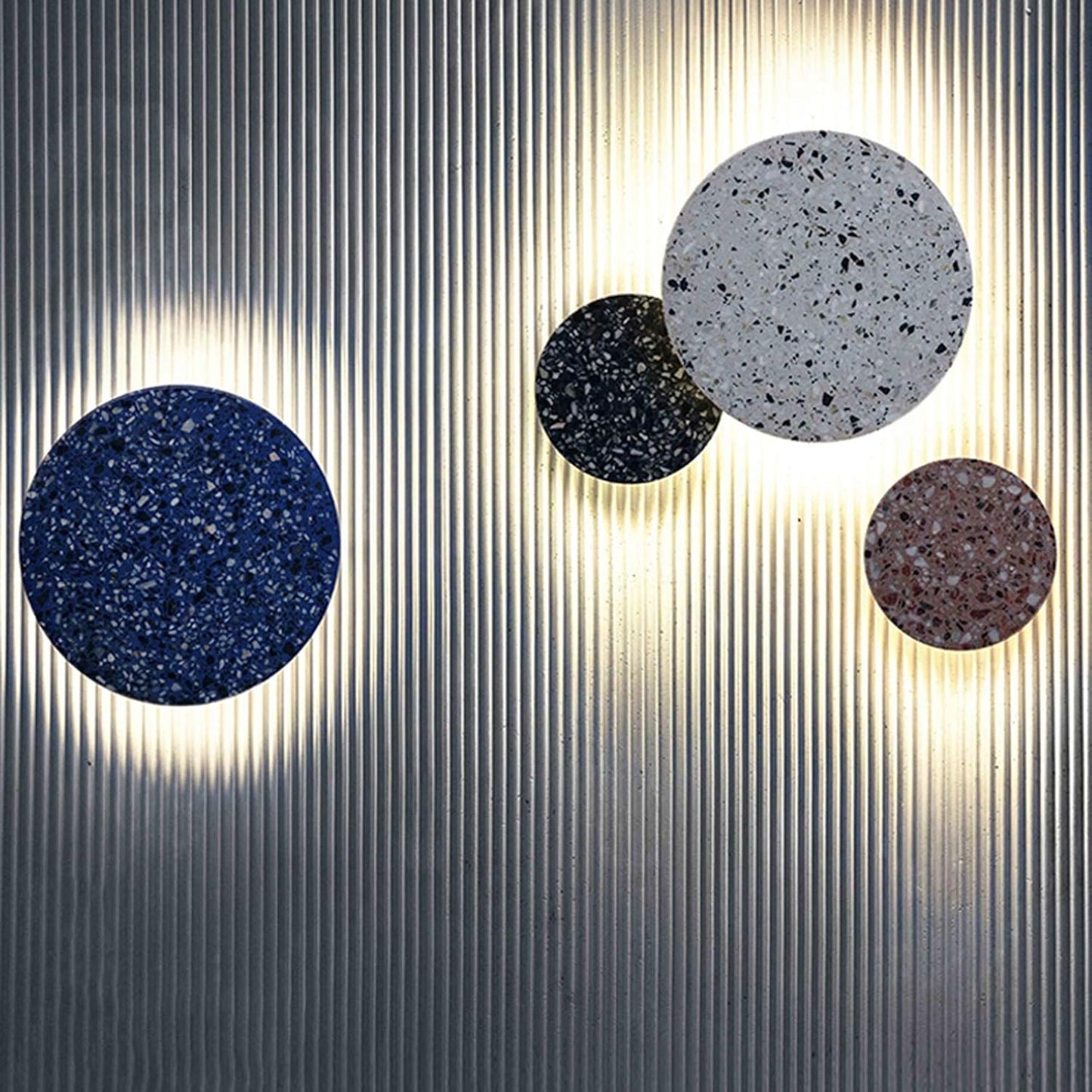 Scandinavian wall lamp featuring a warm LED light and stylish terrazzo finish, perfect for modern minimalist home decor. 1