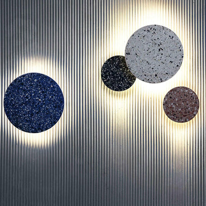 Scandinavian wall lamp featuring a warm LED light and stylish terrazzo finish, perfect for modern minimalist home decor. 1