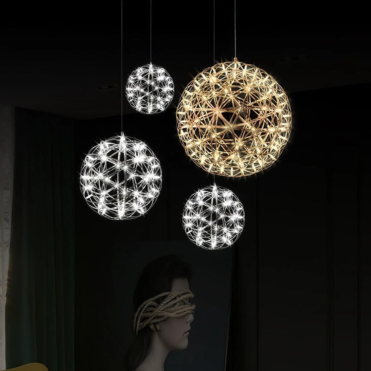 Sculptural pendant light featuring integrated LED technology, adjustable cable, and a sleek modern stainless steel design, perfect for contemporary home decor. 6