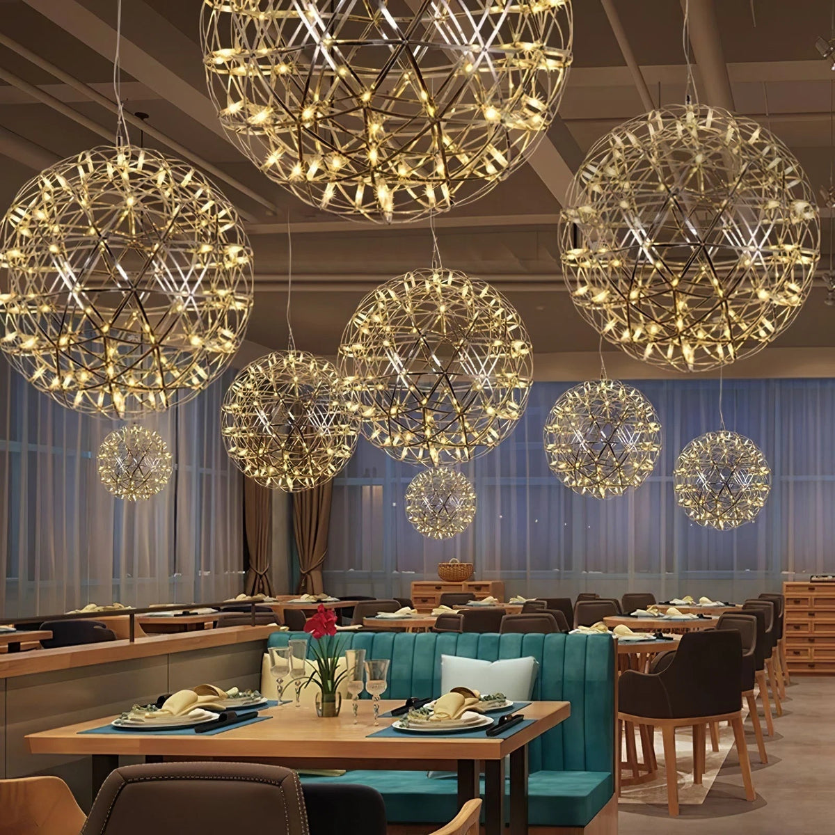 Sculptural pendant light featuring integrated LED technology, adjustable cable, and a sleek modern stainless steel design, perfect for contemporary home decor. 4
