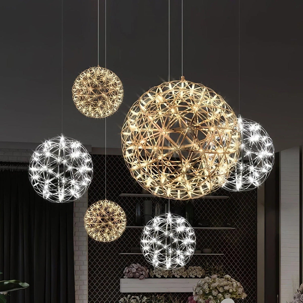 Sculptural pendant light featuring integrated LED technology, adjustable cable, and a sleek modern stainless steel design, perfect for contemporary home decor. 3