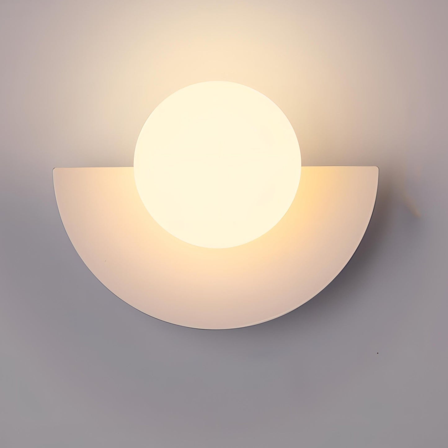 Semi-circular wall lamp featuring a modern Scandinavian design, crafted from metal and plastic, with soft light distribution for a warm ambiance. 0
