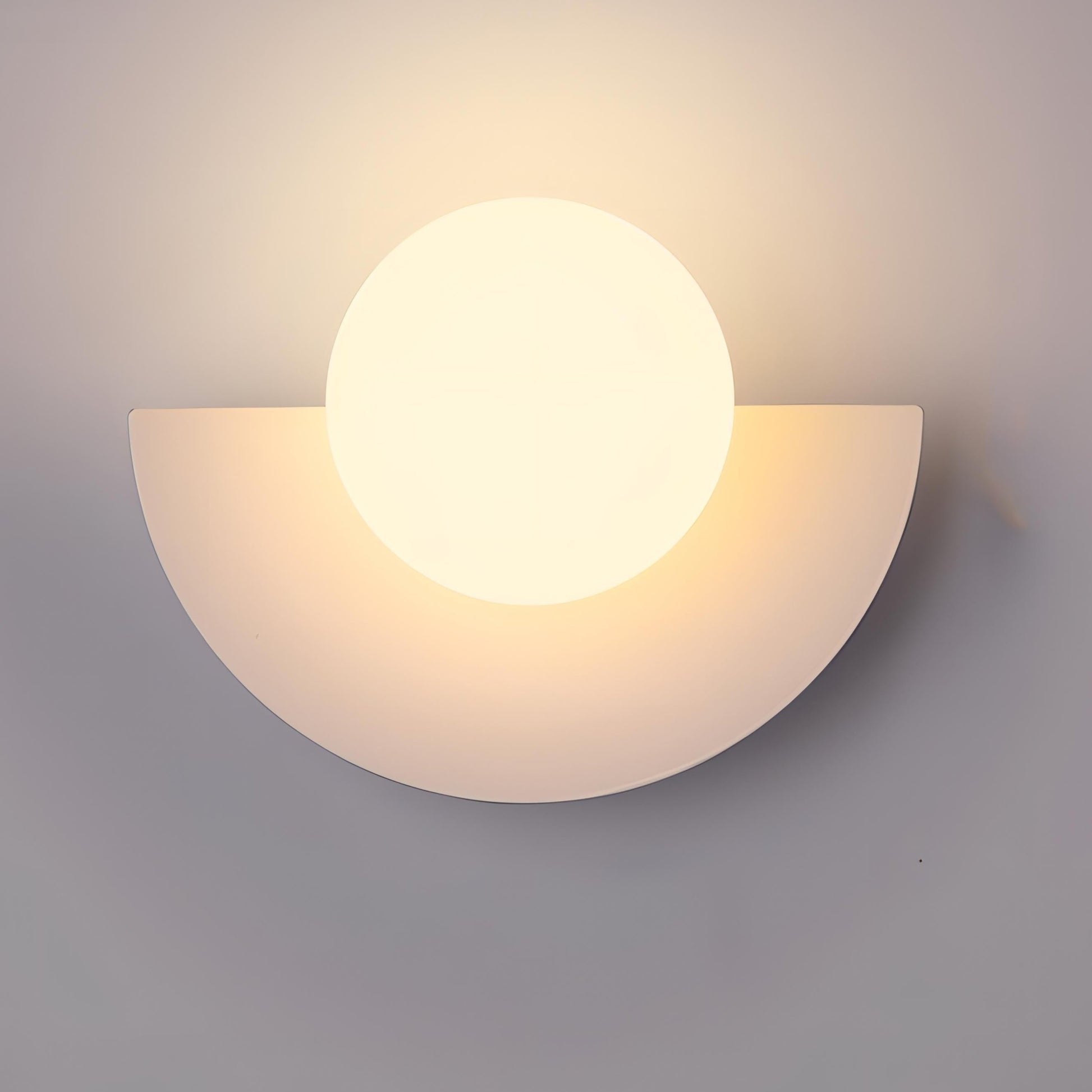 Semi-circular wall lamp featuring a modern Scandinavian design, crafted from metal and plastic, with soft light distribution for a warm ambiance. 0