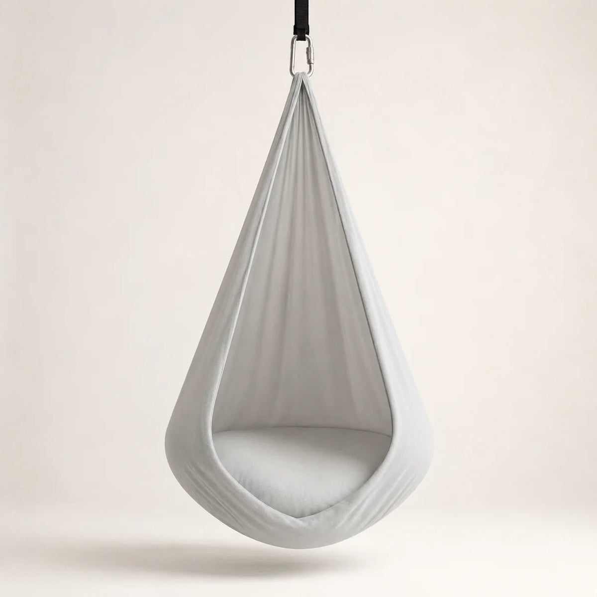 Sensory therapy swing designed for indoor relaxation, featuring a durable and comfortable construction that provides a soothing experience for users. 0