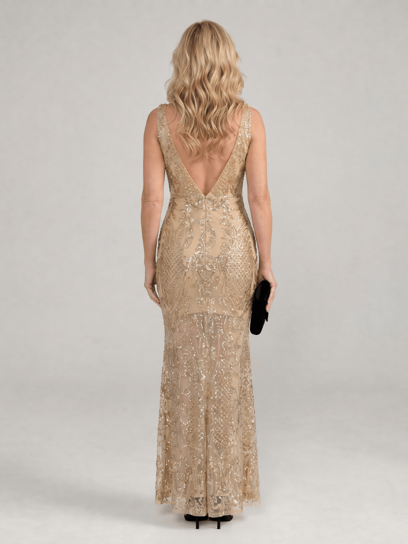 Sequin midi dress featuring sheer panels and a V neckline, designed for elegant evening wear in lightweight mesh fabric. 3