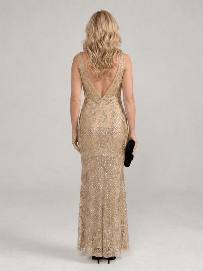 Sequin midi dress featuring sheer panels and a V neckline, designed for elegant evening wear in lightweight mesh fabric. 3
