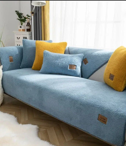 Sherpa fleece sofa cover with non-slip design, providing easy-clean, lint-resistant protection for couches in a cozy living room setting. 6
