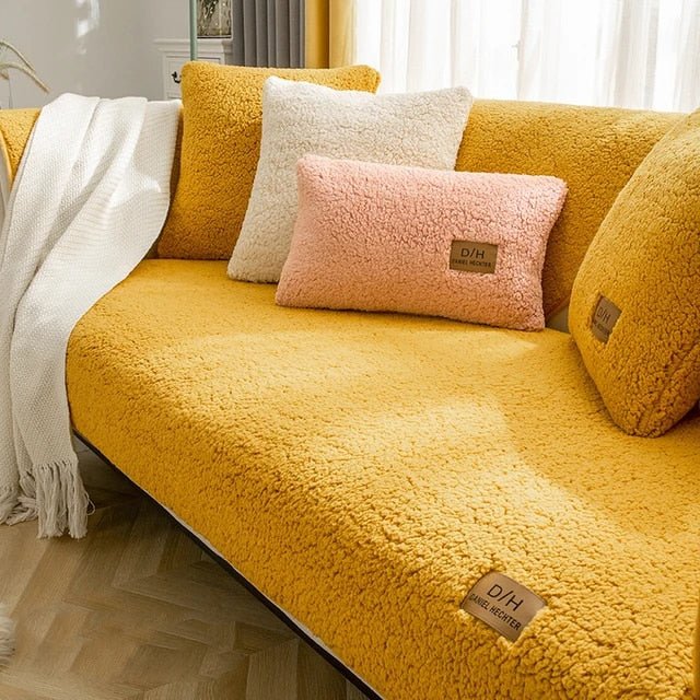 Sherpa fleece sofa cover with non-slip design, providing easy-clean, lint-resistant protection for couches in a cozy living room setting. 4