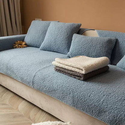 Sherpa fleece sofa cover in a soft, plush texture featuring a non-slip design, ideal for pet-friendly protection and easy machine washing. 3