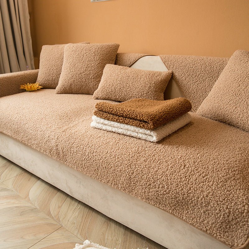 Sherpa fleece sofa cover in a soft, plush texture featuring a non-slip design, ideal for pet-friendly protection and easy machine washing. 5