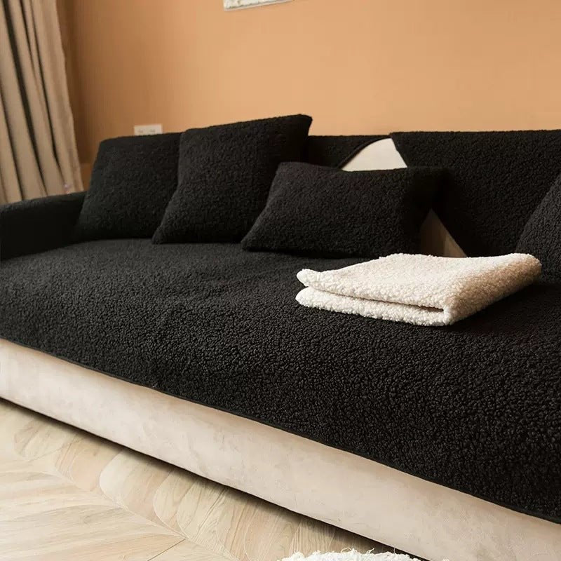 Sherpa fleece sofa cover in a soft, plush texture featuring a non-slip design, ideal for pet-friendly protection and easy machine washing. 2