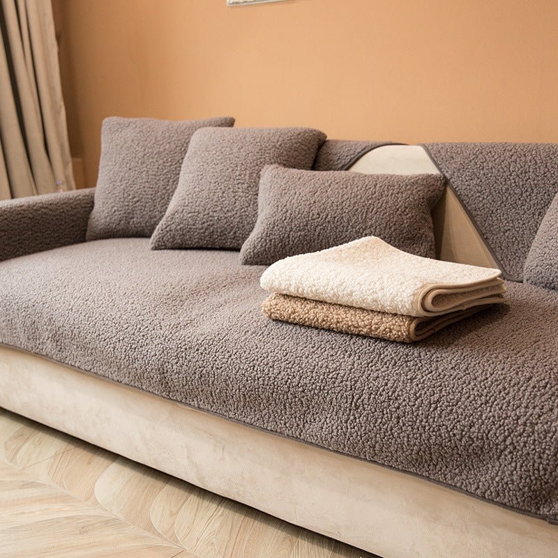 Sherpa fleece sofa cover in a soft, plush texture featuring a non-slip design, ideal for pet-friendly protection and easy machine washing. 1