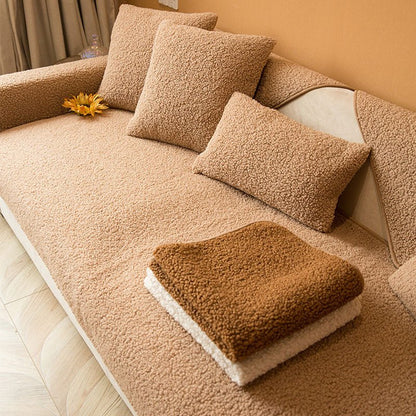 Sherpa fleece sofa cover in a soft, plush texture featuring a non-slip design, ideal for pet-friendly protection and easy machine washing. 4